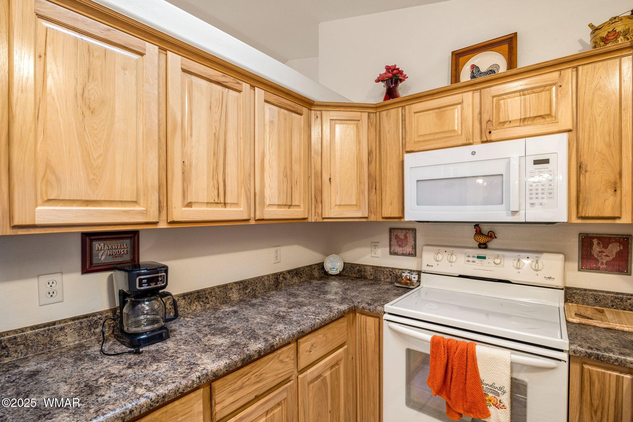 2088 Round-Up Road Overgaard, AZ 85933 - Photo 7 of 35 a kitchen with granite countertop a sink stainless steel appliances and cabinets