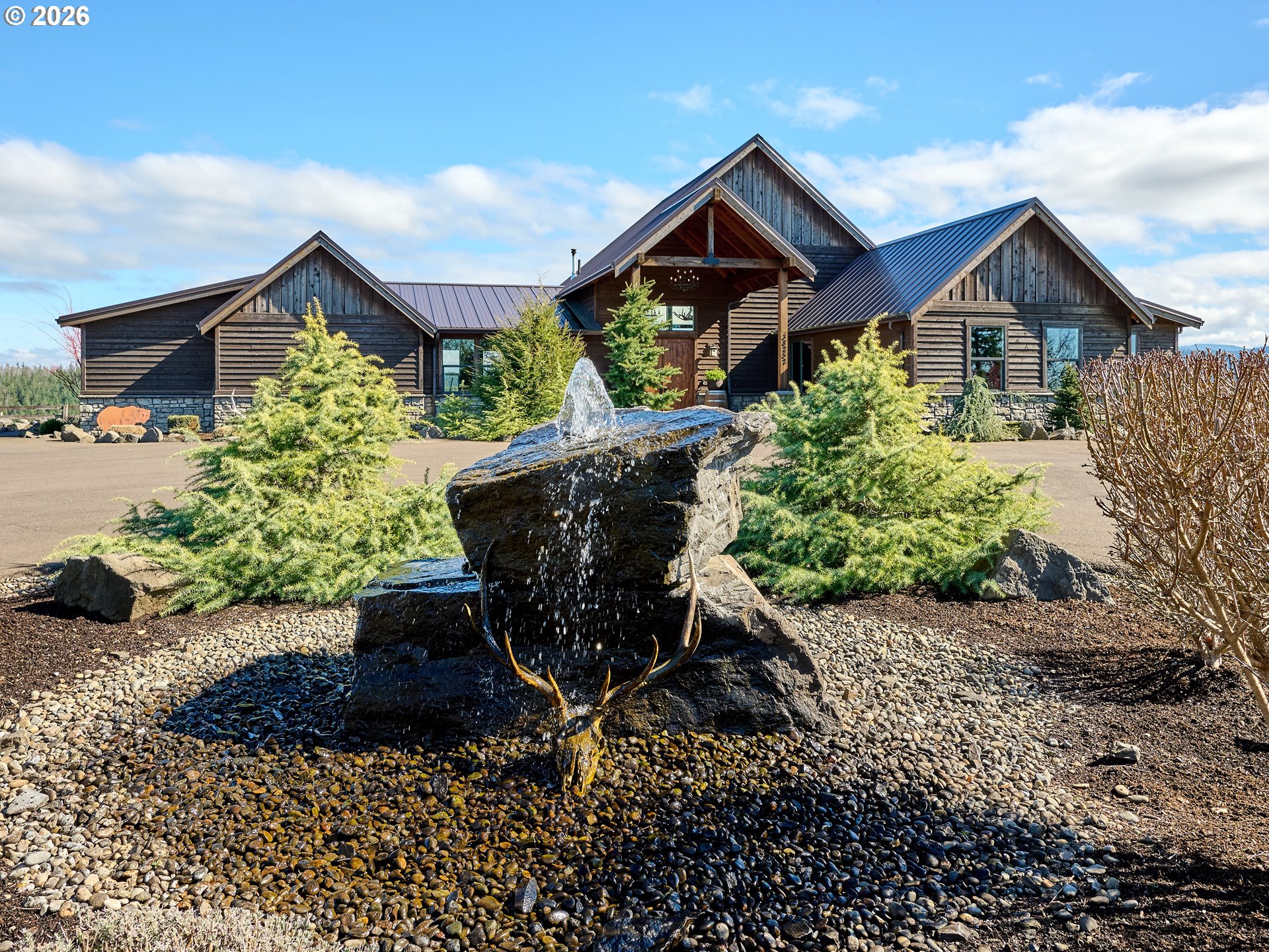 38252 South Blair Road Molalla, OR 97038 - Photo 22 of 47 a front view of a house with a yard