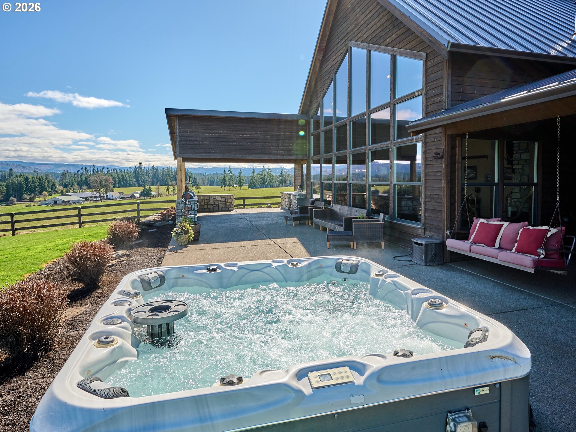 38252 South Blair Road Molalla, OR 97038 - Photo 25 of 47 a view of a patio with a table and chairs