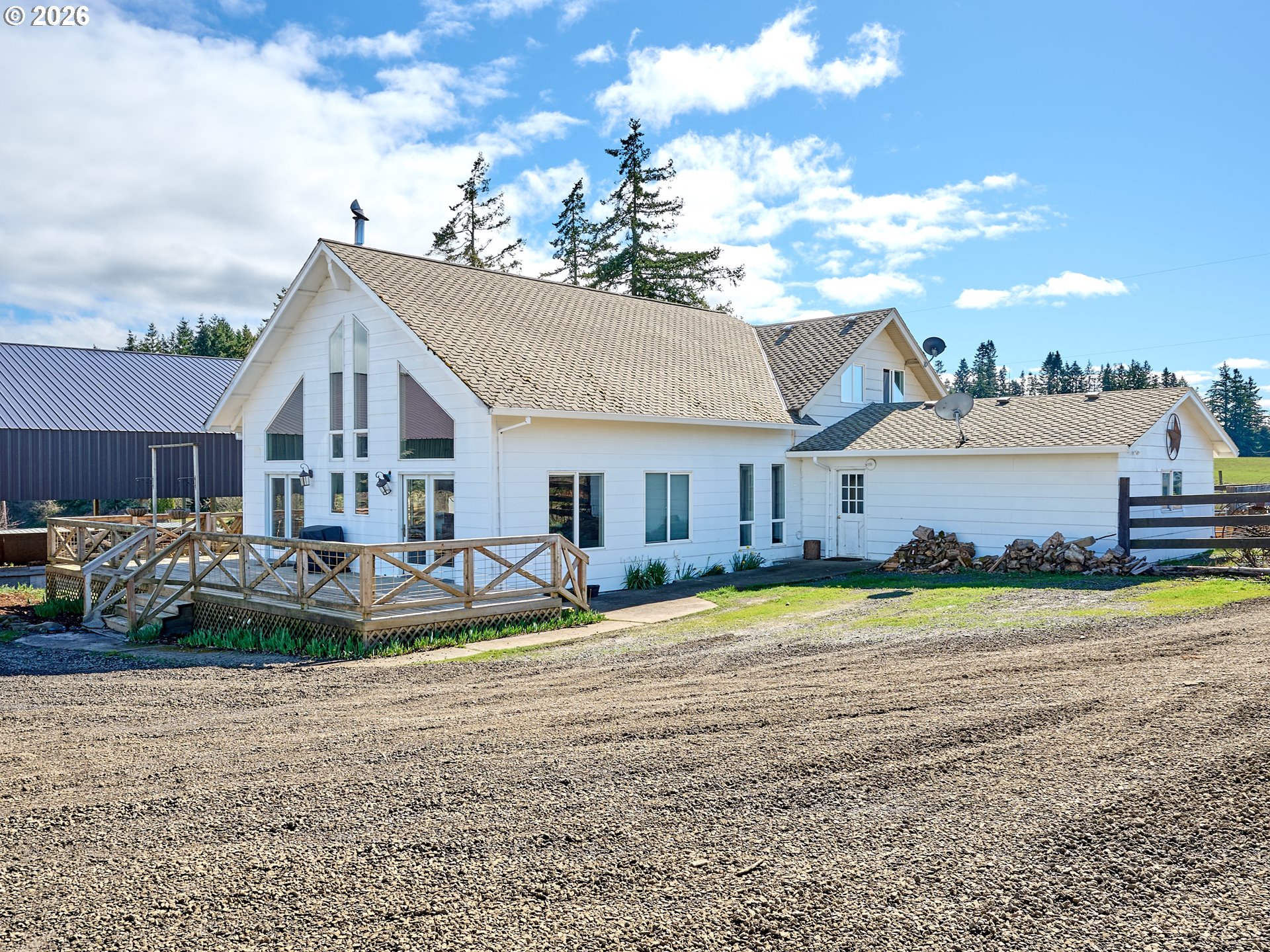 38252 South Blair Road Molalla, OR 97038 - Photo 32 of 47 a view of a house with backyard patio and swimming pool