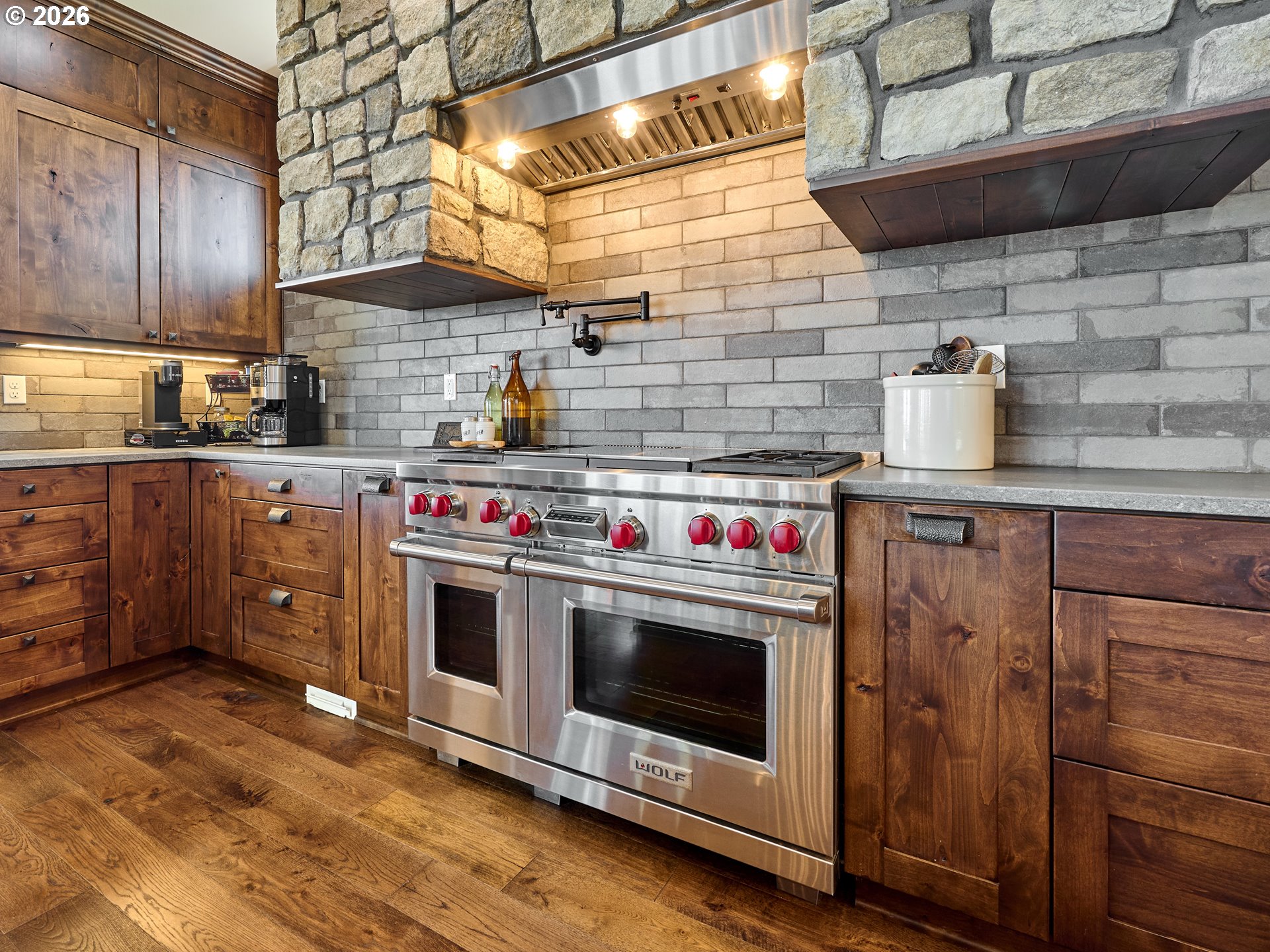 38252 South Blair Road Molalla, OR 97038 - Photo 8 of 47 a kitchen with stainless steel appliances and wooden cabinets