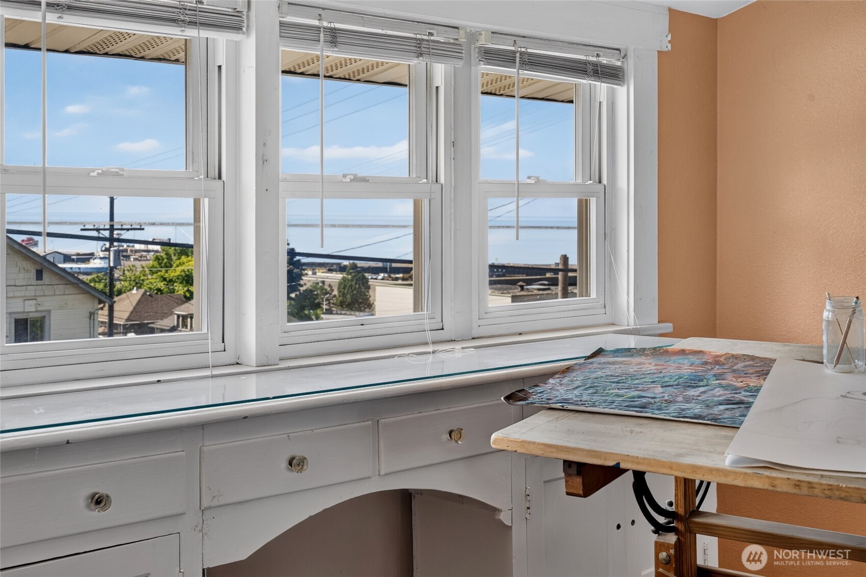237 West 3rd Street Port Angeles, WA 98362 - Photo 25 of 40 a kitchen with a sink and a window