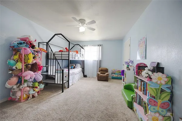 a bedroom with lots of baby toys