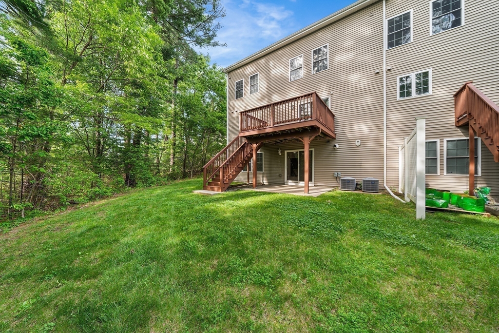 215 Rangeway Road, Unit 31 Billerica, MA 01862 - Photo 37 of 40 front view of house with a yard