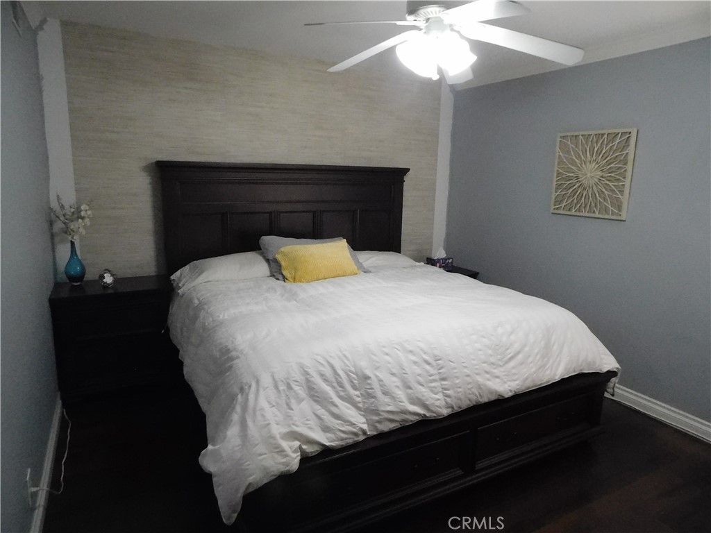 2013 Morning Canyon Road Diamond Bar, CA 91765 - Photo 11 of 26 a bed sitting in a bedroom with a chandelier