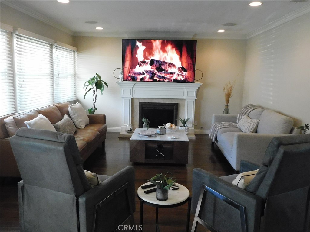 2013 Morning Canyon Road Diamond Bar, CA 91765 - Photo 2 of 26 a living room with furniture a fireplace and a flat screen tv