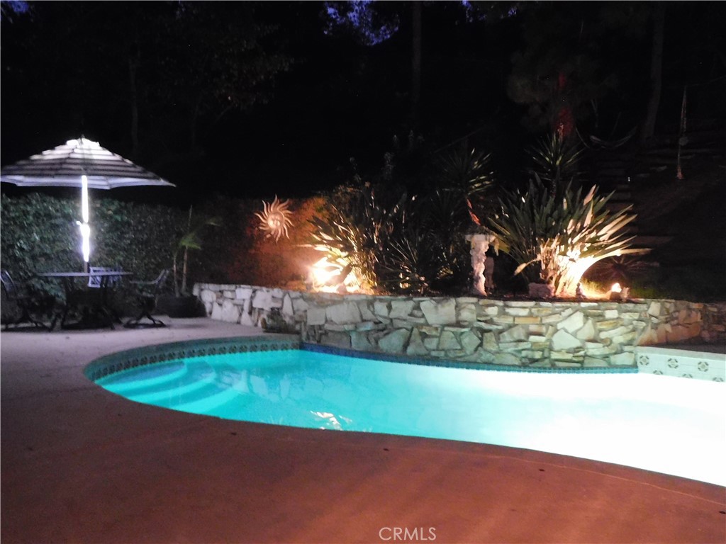 2013 Morning Canyon Road Diamond Bar, CA 91765 - Photo 22 of 26 a table and chairs in backyard of house