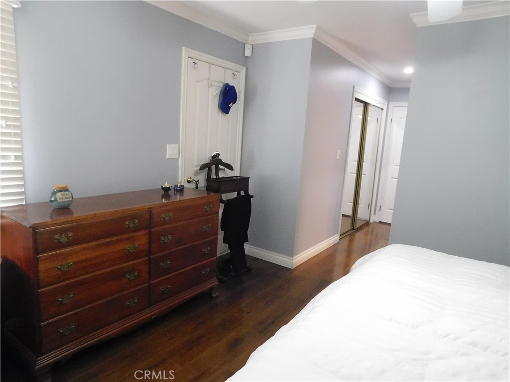 2013 Morning Canyon Road Diamond Bar, CA 91765 - Photo 25 of 26 a room with a bed and a mirror