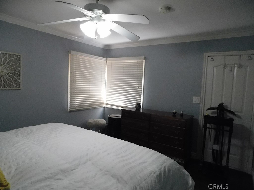 2013 Morning Canyon Road Diamond Bar, CA 91765 - Photo 26 of 26 a bedroom with a bed and a chandelier
