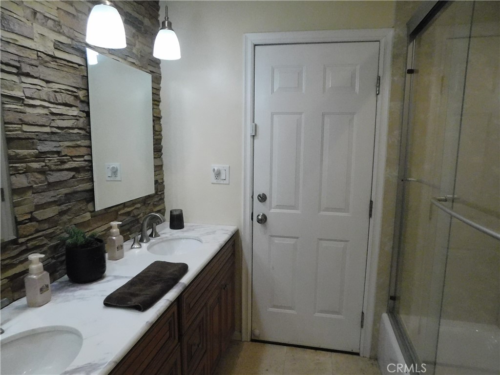 2013 Morning Canyon Road Diamond Bar, CA 91765 - Photo 5 of 26 a bathroom with a sink and a mirror