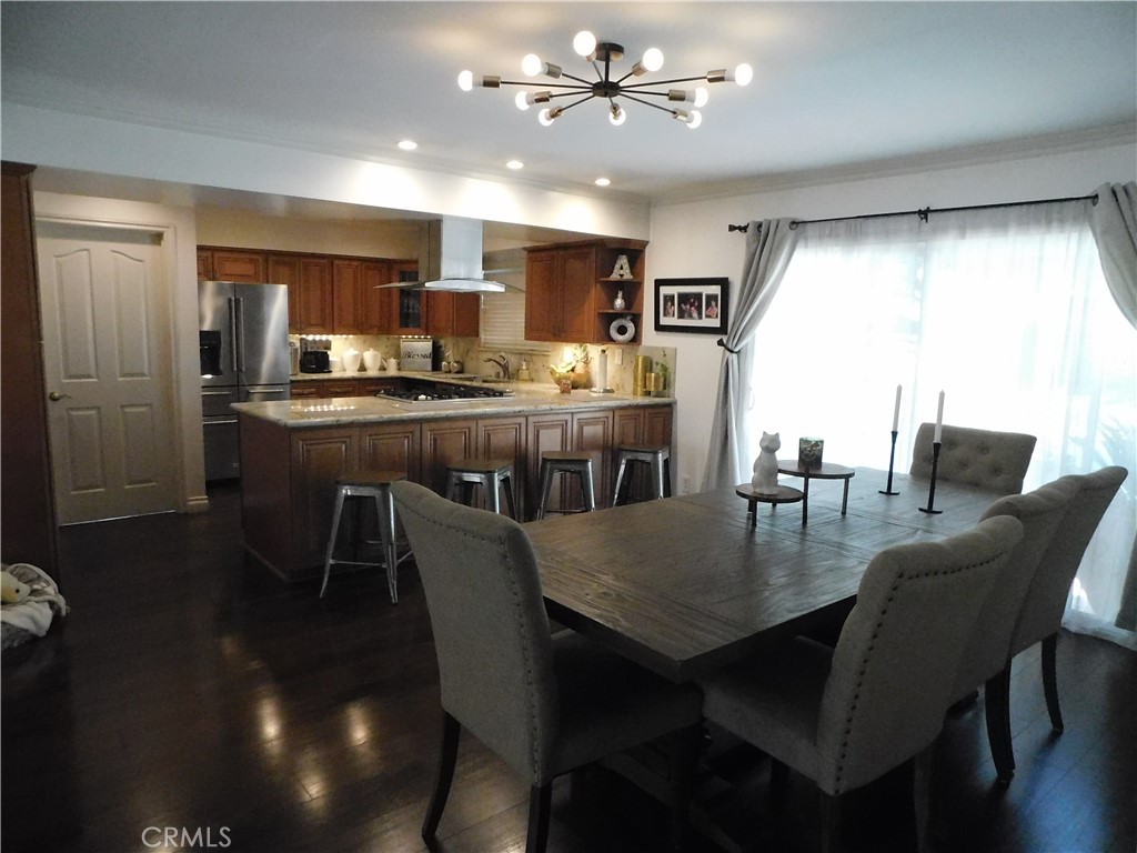2013 Morning Canyon Road Diamond Bar, CA 91765 - Photo 8 of 26 a view of a dining room with furniture window and wooden floor