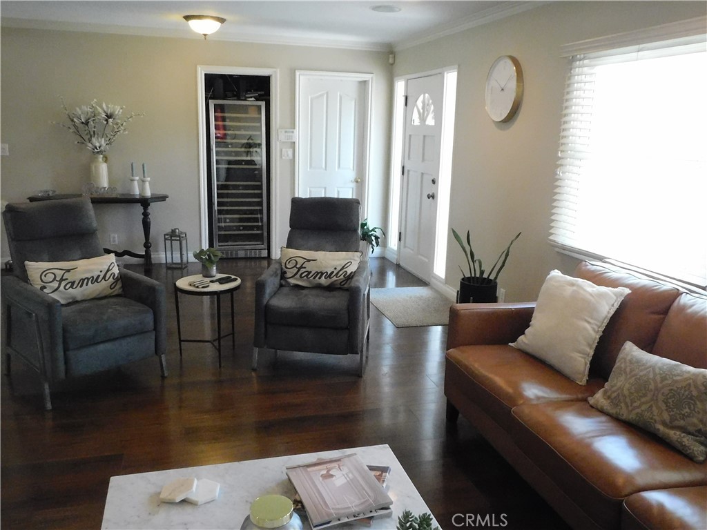 2013 Morning Canyon Road Diamond Bar, CA 91765 - Photo 9 of 26 a living room with furniture and a flat screen tv
