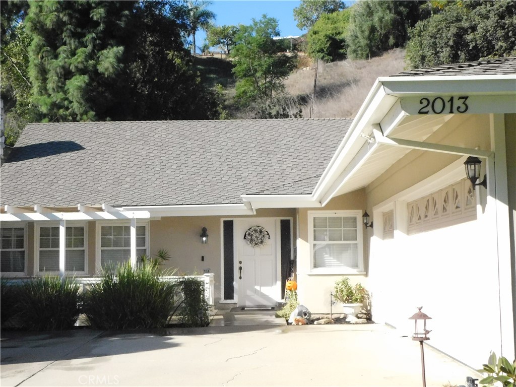 2013 Morning Canyon Road Diamond Bar, CA 91765 - Photo 10 of 26 a front view of a house with garden