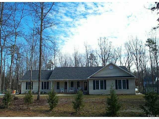 422 Esther Road Roxboro, NC 27573 - Photo 1 of 1 front view of a house with a yard