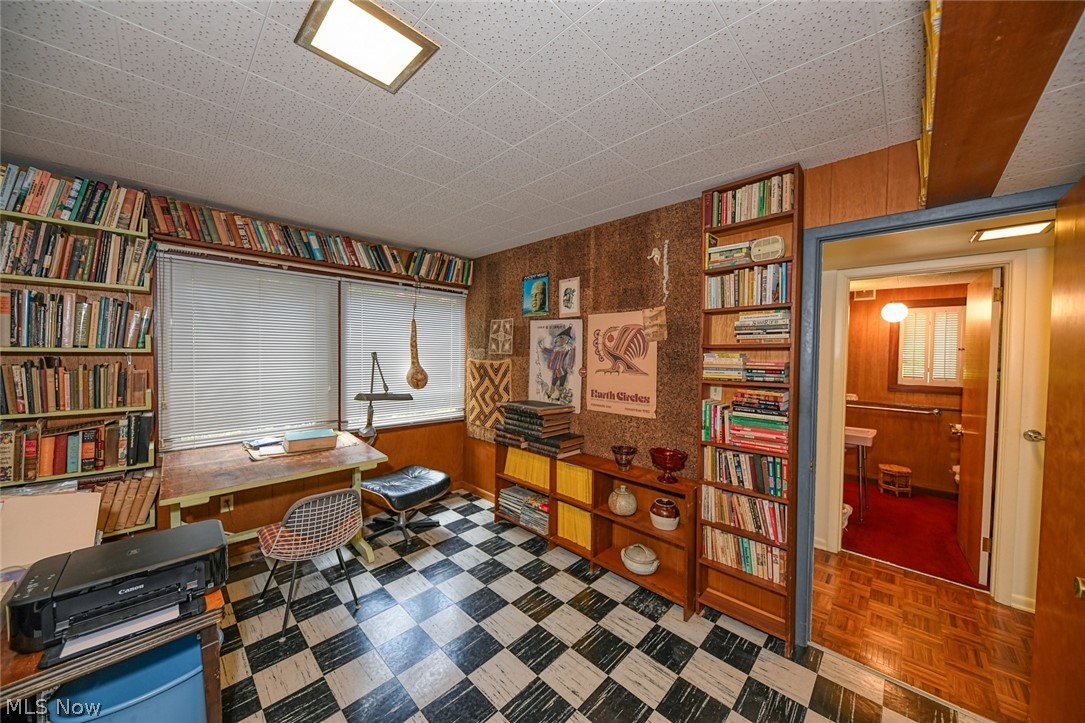 7324 Westview Road Kent, OH 44240 - Photo 5 of 28 This is the lower level office or studio. Lots of built-in book cases, and convenient to the full bath and laundry room. This room also has built-in greenhouse space.