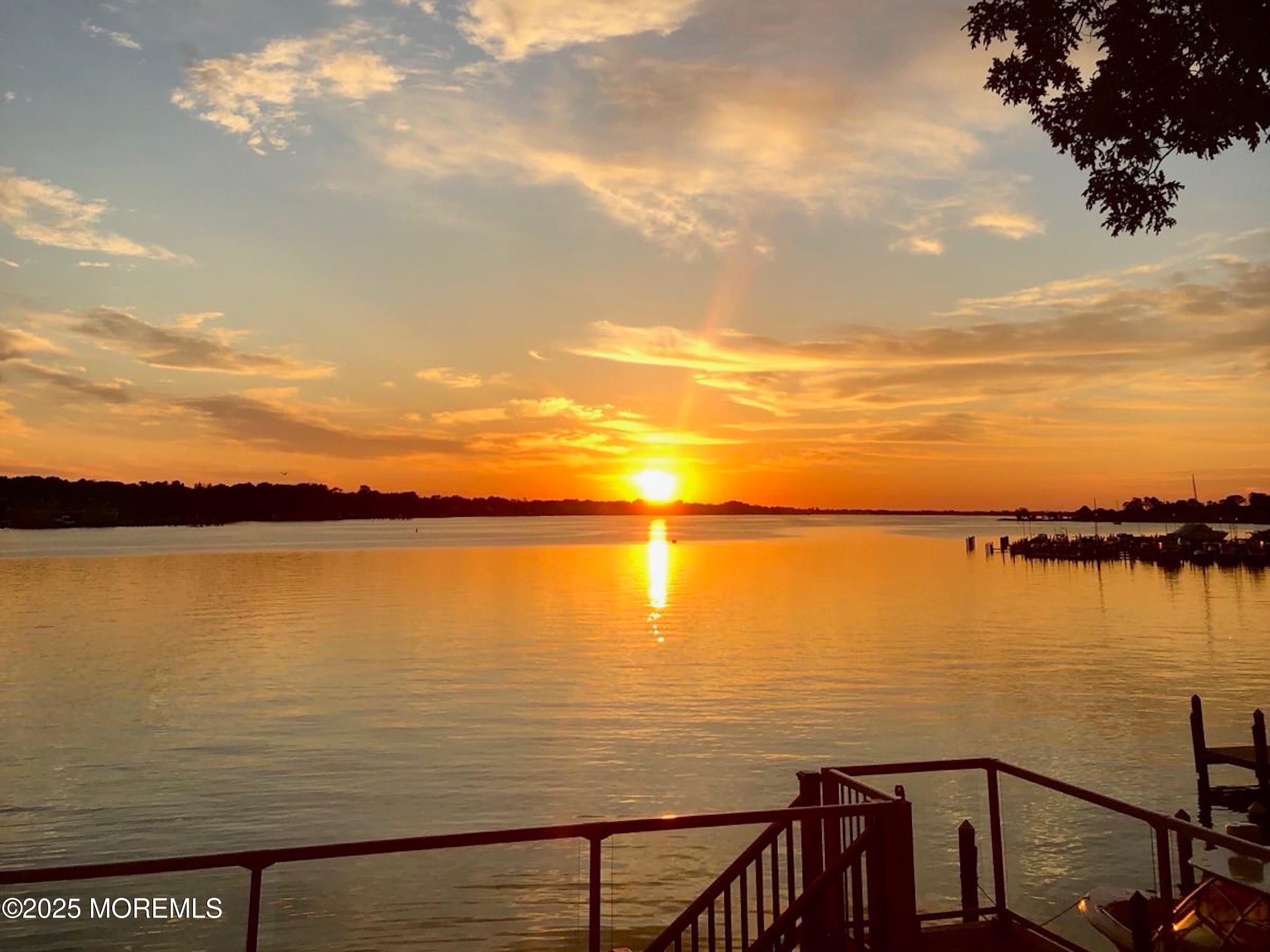 53 Edwards Road Brick, NJ 08723 - Photo 2 of 78 a view of a lake from a balcony