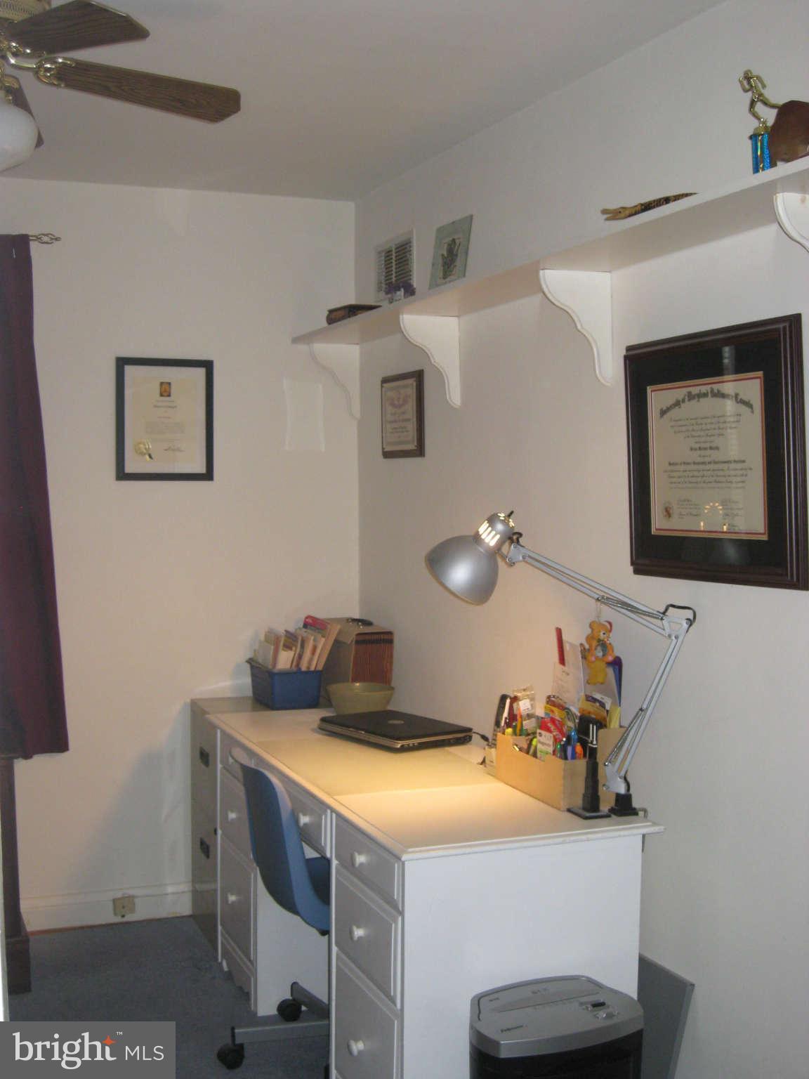 436 Greenlow Road Baltimore, MD 21228 - Photo 22 of 30 a bedroom with a bed and cabinets
