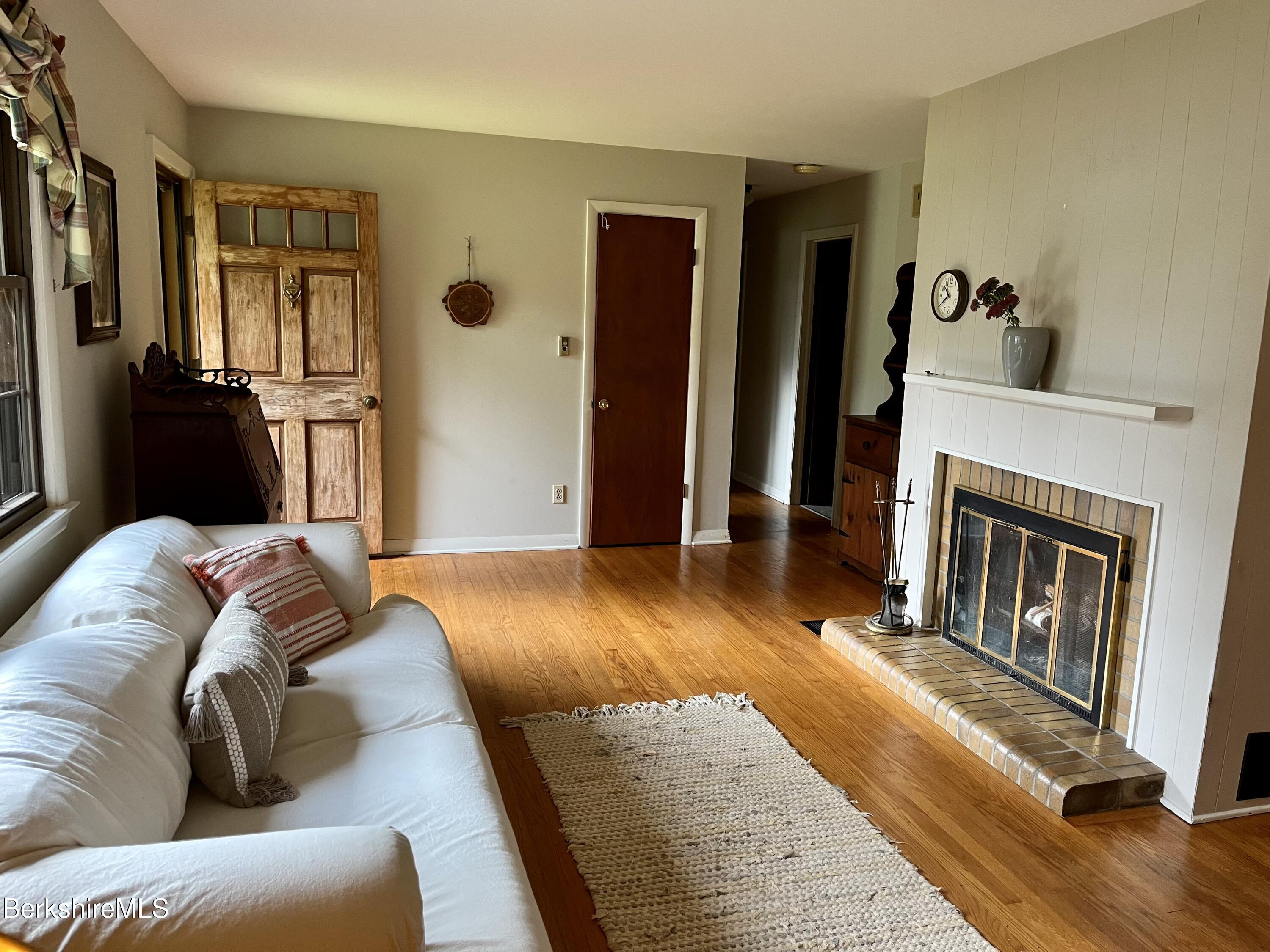 28 Chestnut Street Dalton, MA 01226 - Photo 12 of 33 a bed room with a bed and a television