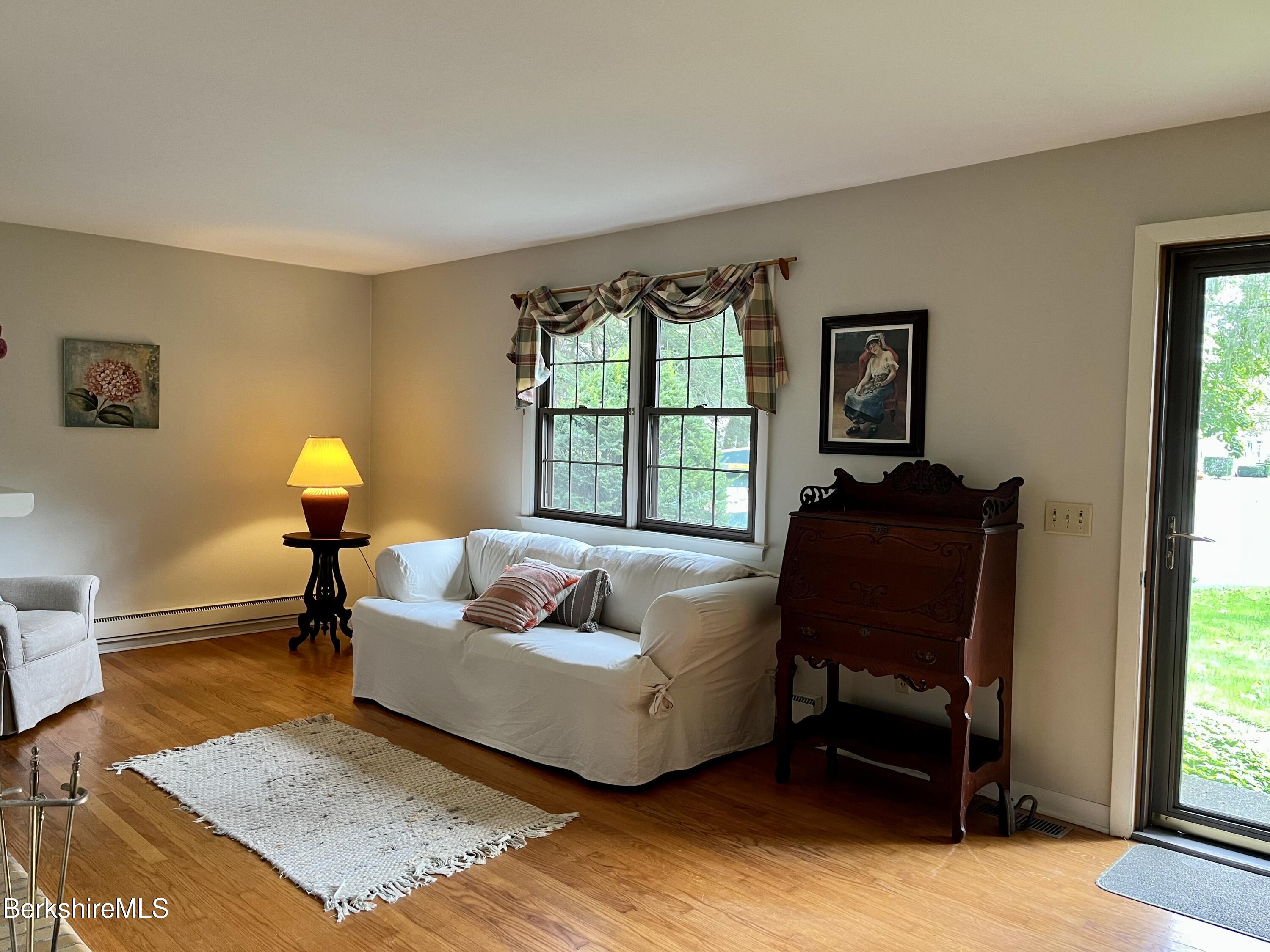 28 Chestnut Street Dalton, MA 01226 - Photo 14 of 33 a living room with furniture and a window