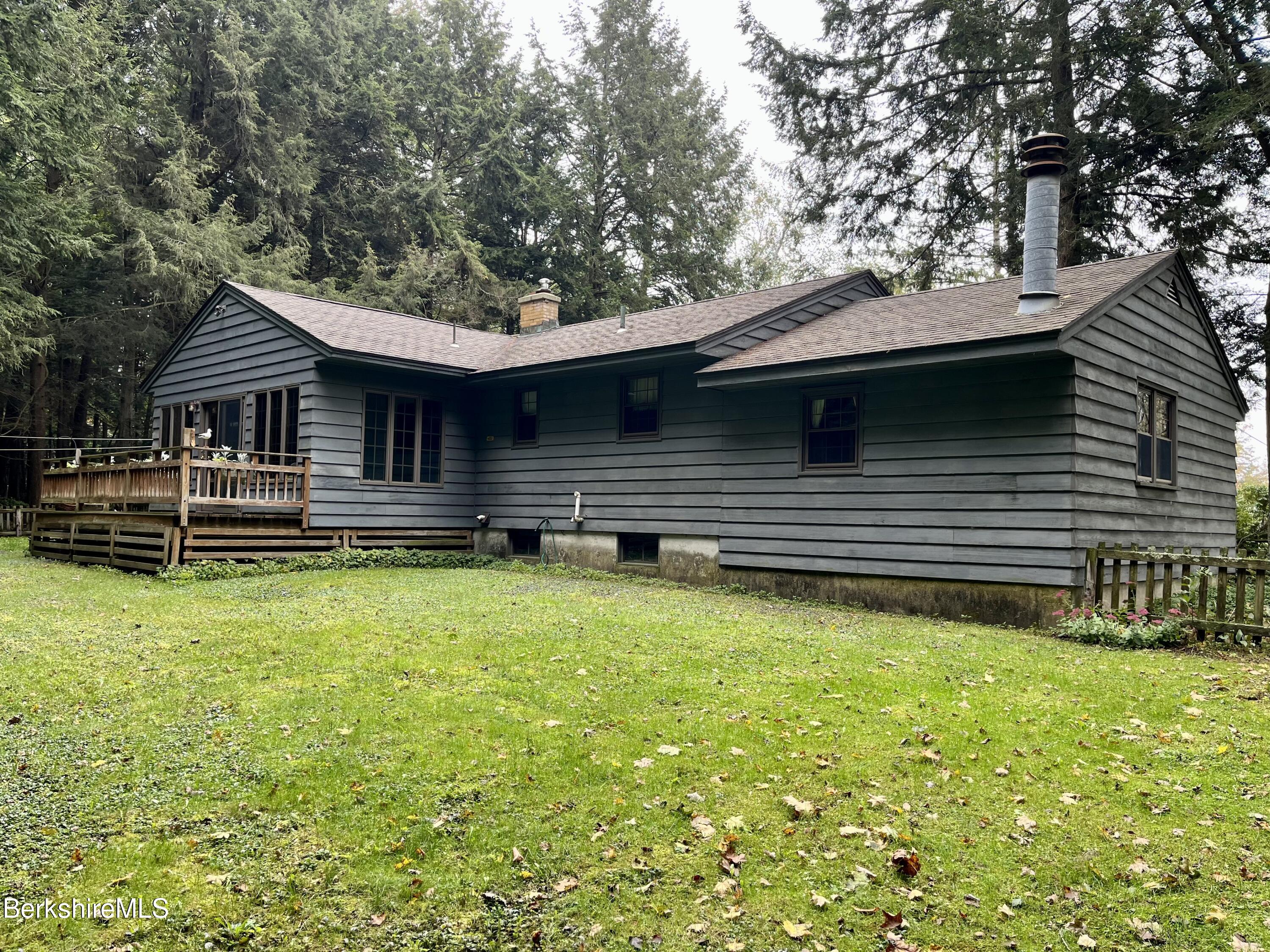 28 Chestnut Street Dalton, MA 01226 - Photo 3 of 33 a front view of a house with swimming pool