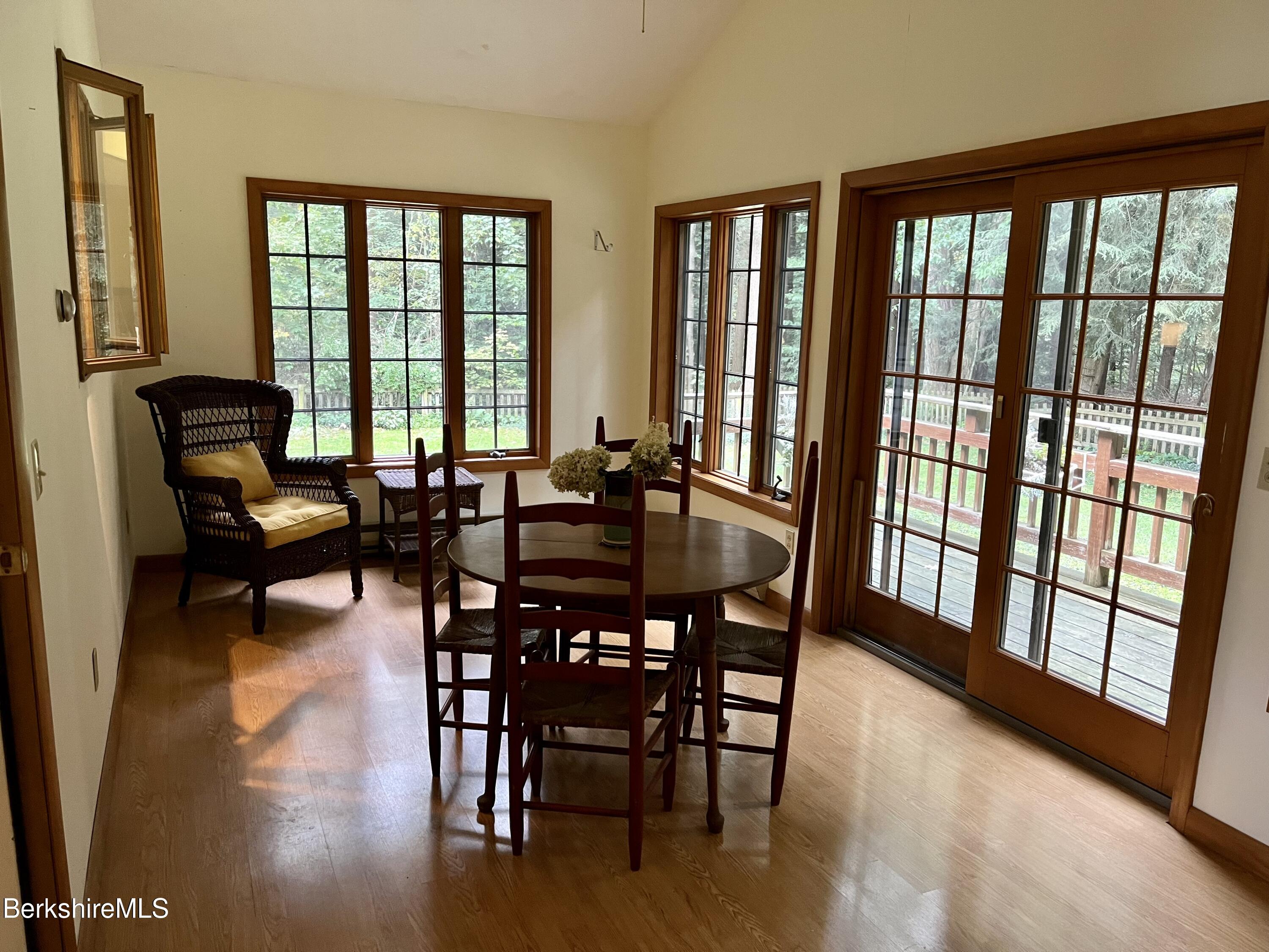 28 Chestnut Street Dalton, MA 01226 - Photo 6 of 33 a view of a dining room with furniture window and wooden floor