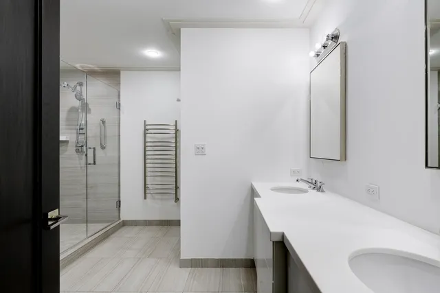 a bathroom with a sink and mirror