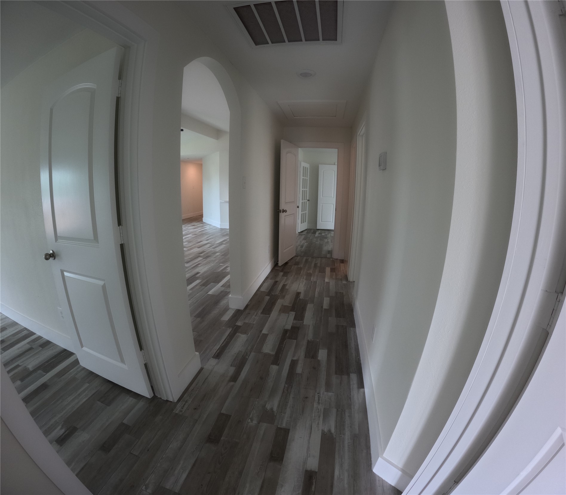 8419 Hannah Rd Cove Cove, TX 77523 - Photo 24 of 28 a view of a hallway and wooden floor