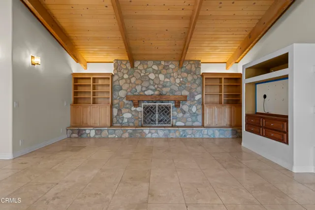 a group of chairs sitting in a room next to a window