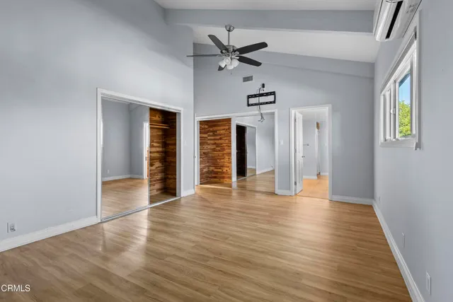 a bathroom with a granite countertop sink mirror and double
