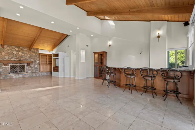 a view of a swimming pool with a house