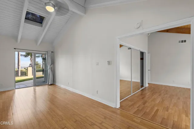 a kitchen with stainless steel appliances wooden cabinets and a sink