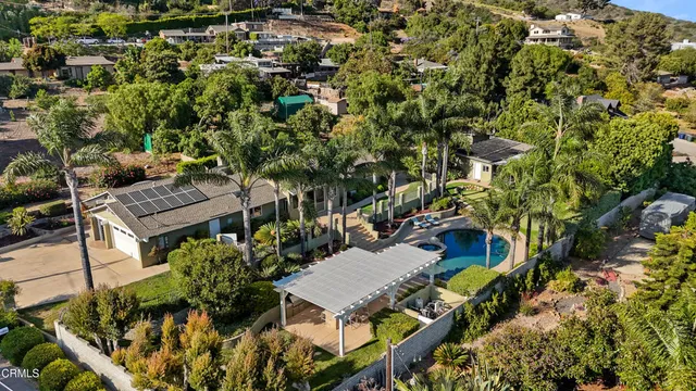 a view of swimming pool with a yard