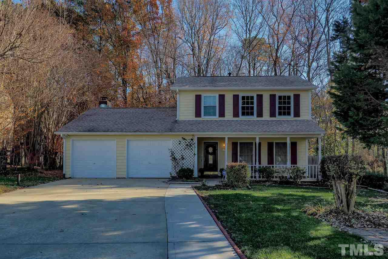 2309 Carthage Circle Raleigh, NC 27604 - Photo 2 of 23 a front view of a house with a yard