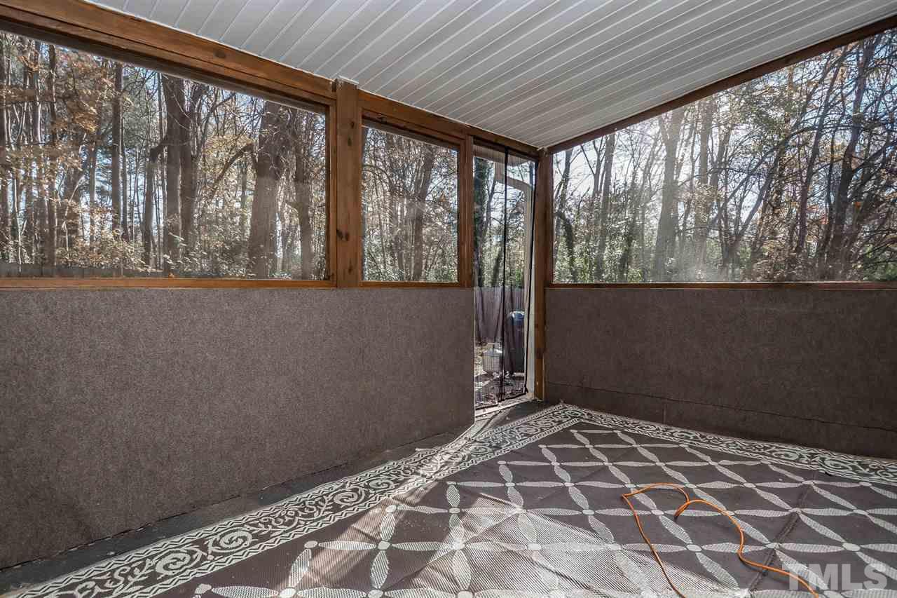 2309 Carthage Circle Raleigh, NC 27604 - Photo 20 of 23 a view of an empty room with a window