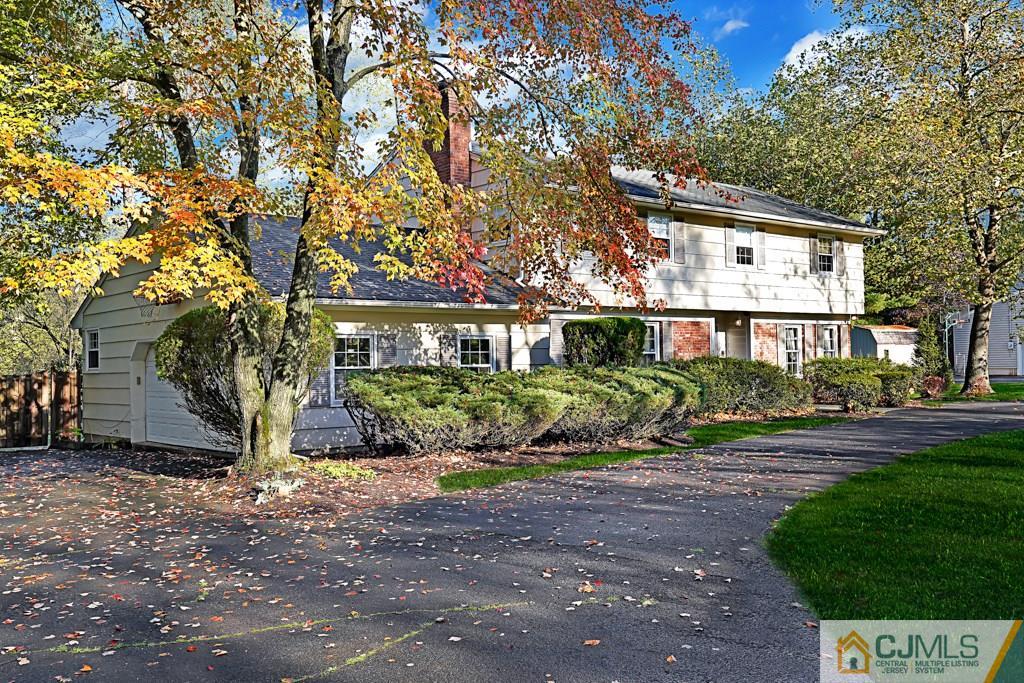 1081 Raritan Road Scotch Plains, NJ 07076 - Photo 2 of 27 a view of a house with a yard