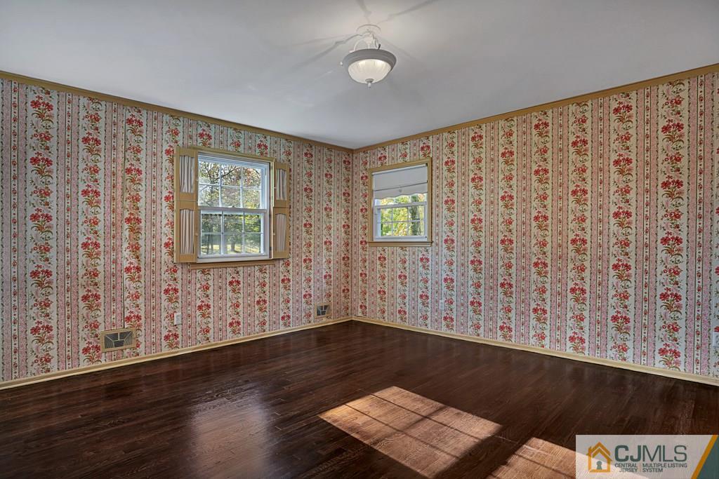 1081 Raritan Road Scotch Plains, NJ 07076 - Photo 15 of 27 wooden floor in an empty room