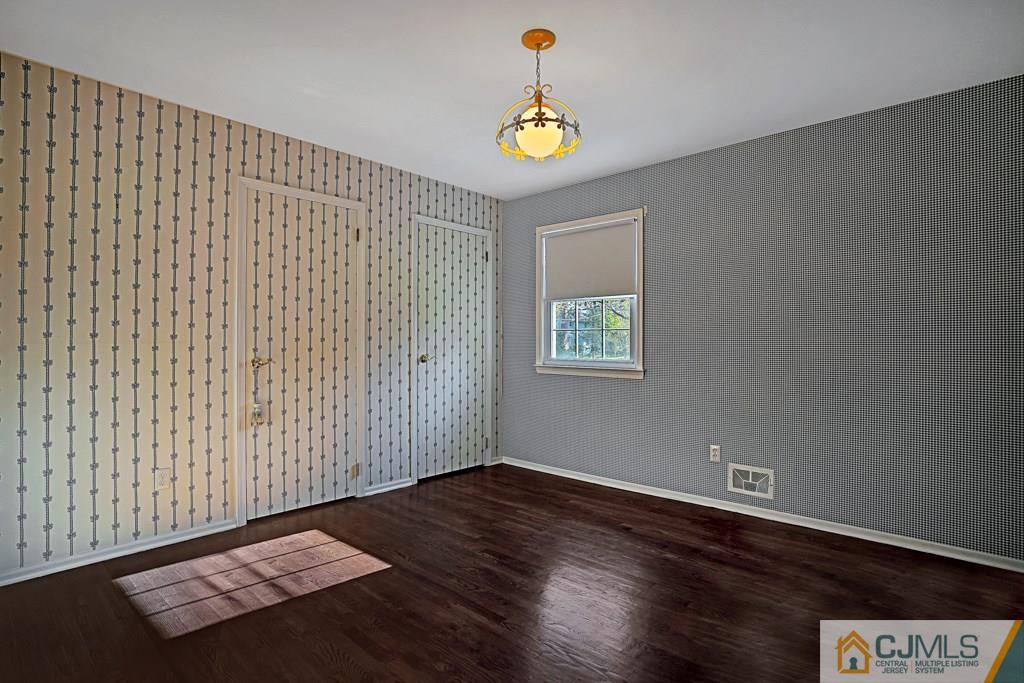 1081 Raritan Road Scotch Plains, NJ 07076 - Photo 16 of 27 a view of an empty room and a window