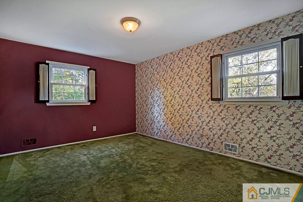 1081 Raritan Road Scotch Plains, NJ 07076 - Photo 17 of 27 an empty room with windows