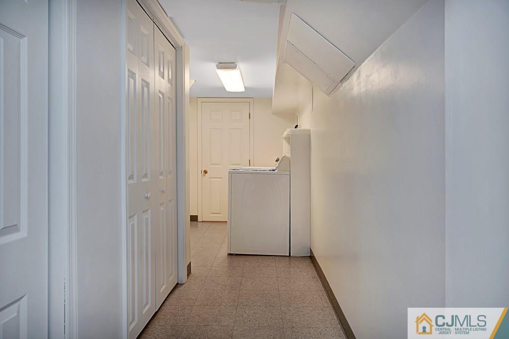 1081 Raritan Road Scotch Plains, NJ 07076 - Photo 22 of 27 a view of a hallway with closet area