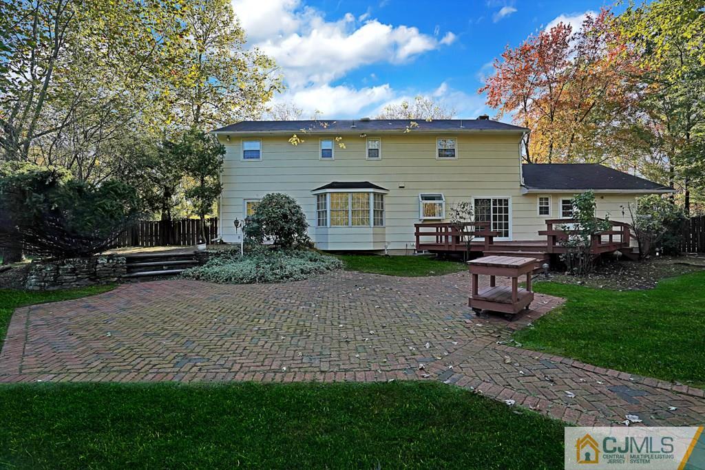 1081 Raritan Road Scotch Plains, NJ 07076 - Photo 24 of 27 a front view of a house with garden
