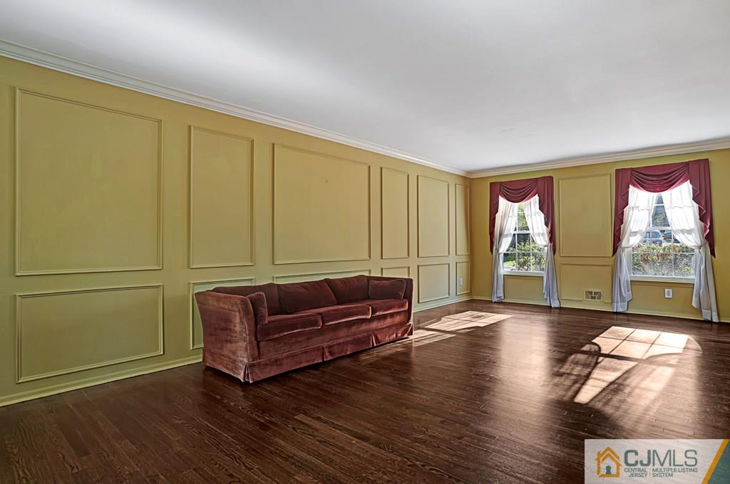 1081 Raritan Road Scotch Plains, NJ 07076 - Photo 4 of 27 a living room with couch and a large window