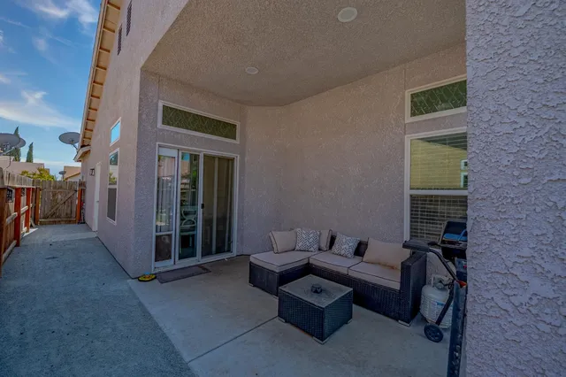 a building outdoor space with patio furniture