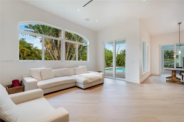 a bedroom with a bed and a night stand