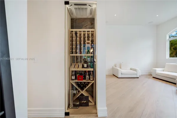 a close view of a closet with washer and dryer