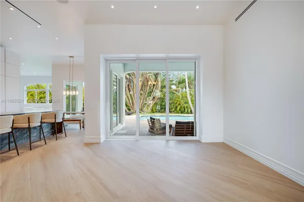 a kitchen with granite countertop a stove and a sink