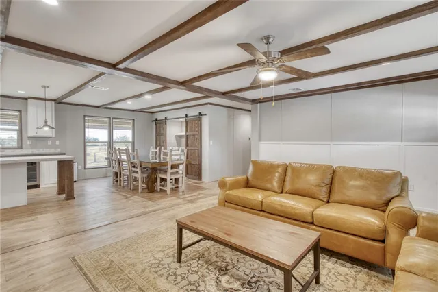 a kitchen with granite countertop a stove and a sink