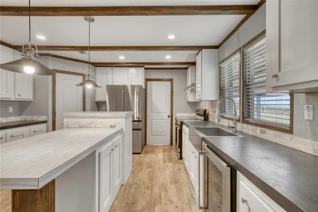 a utility room with racks on the wall