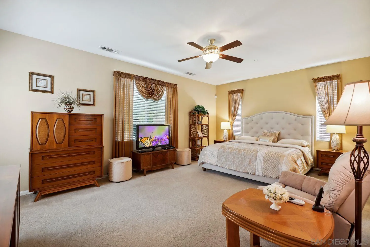 3250 Beven Drive Escondido, CA 92027 - Photo 12 of 34 a bedroom with a bed and wooden floor