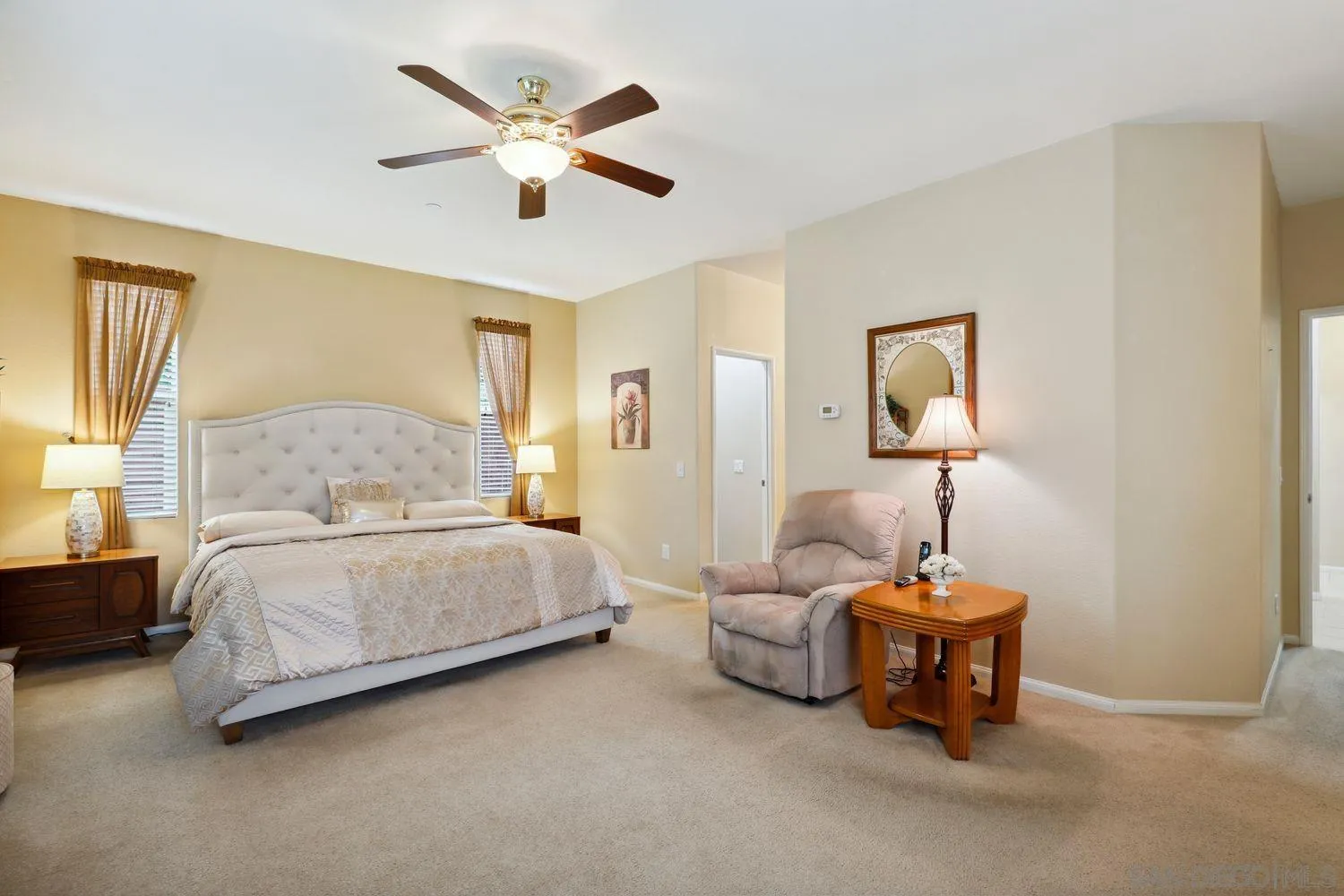 3250 Beven Drive Escondido, CA 92027 - Photo 13 of 34 a bedroom with a bed and a lamp on table