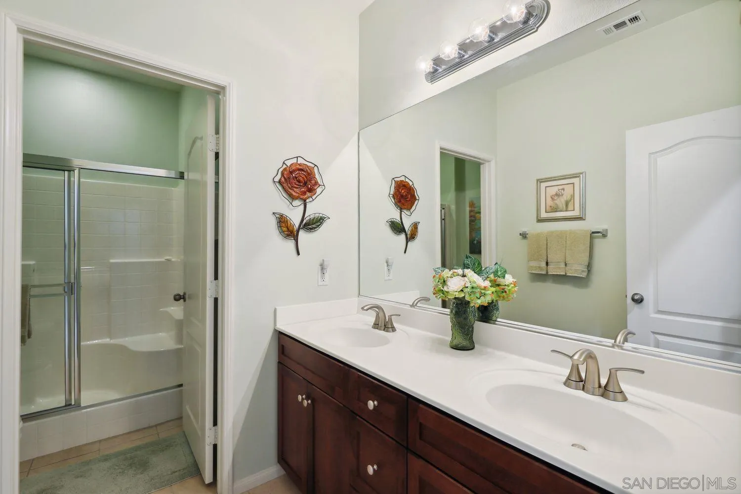 3250 Beven Drive Escondido, CA 92027 - Photo 17 of 34 a bathroom with a double vanity sink mirror and shower